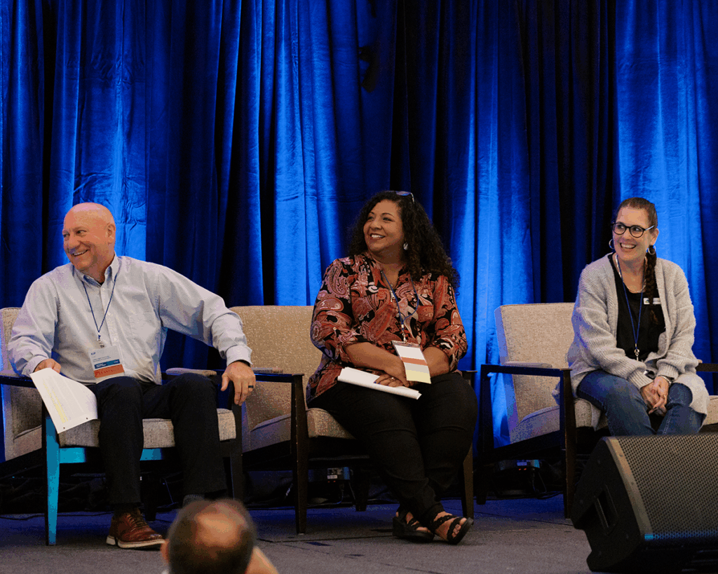 (L to R) Kip Parks, Maria Catron, and Stace Karge speak during the Four Corner Working Groups session at the 2025 Fahe Annual Meeting, highlighting network progress in advocacy, capacity building, narrative, and funding.