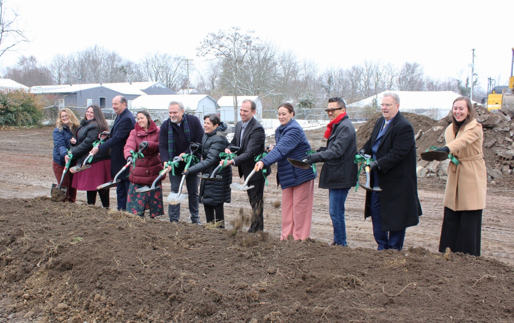 group of people with shovels